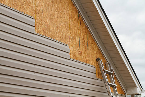 Professional Emergency Siding Repair technician working in Stow, OH